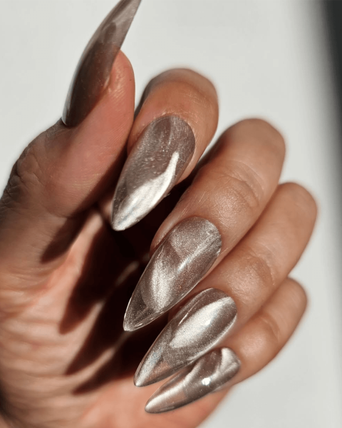Silver cateye swirl nails
